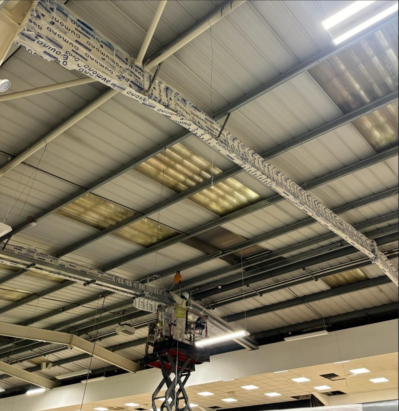 Fire Fort carrying out structural steel fire protection works with intumescent paint on a Surrey project