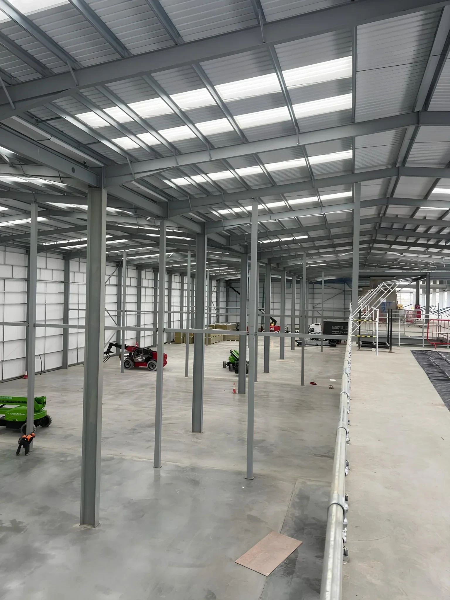Intumescent paint applied to structural steel in a commercial warehouse in Derby